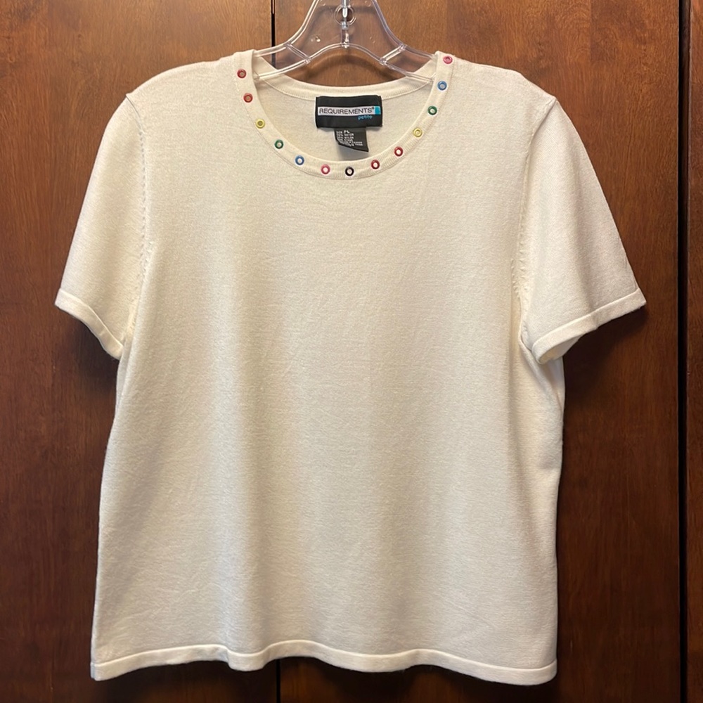 Requirements off-white knit tee with rainbow grommets